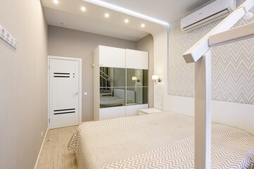 interior room apartment bedroom with bed, cozy place to sleep and relax