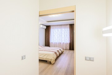 interior room apartment bedroom with bed, cozy place to sleep and relax