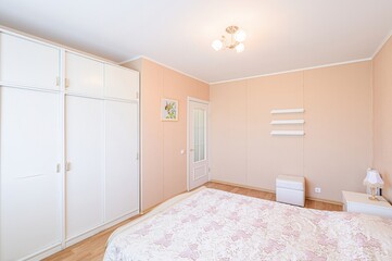 interior room apartment bedroom with bed, cozy place to sleep and relax