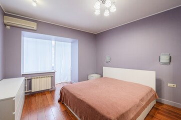 interior room apartment bedroom with bed, cozy place to sleep and relax