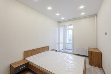 interior room apartment bedroom with bed, cozy place to sleep and relax