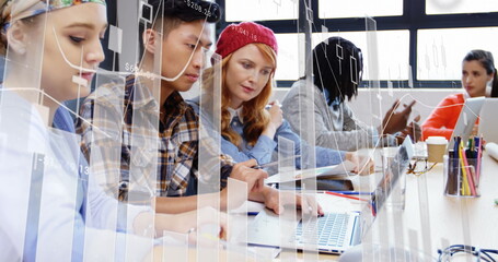 Image of finance data over group of diverse businesspeople working with technology in office