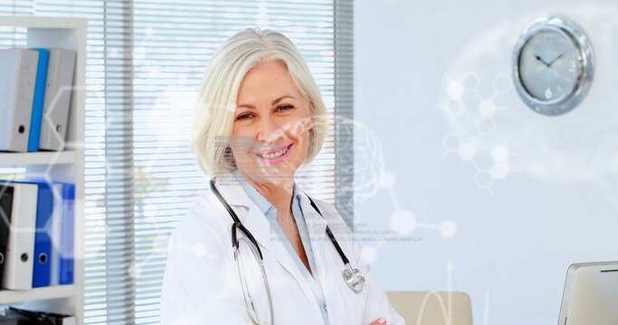 Image of chemical formulas and data processing over happy caucasian senior female doctor - Powered by Adobe