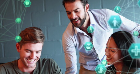 Image of network of connections with icons over business people