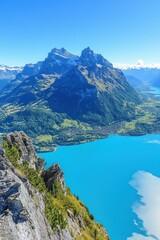 Obraz premium Alpine lake panorama from a mountain peak