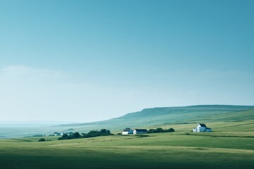 Naklejka premium serene rural landscape with blurred figures in background existing in their peaceful life routine