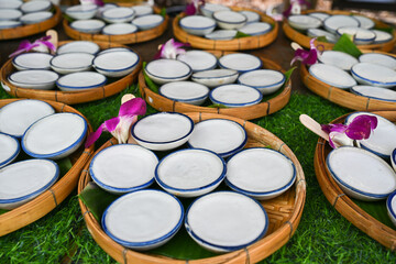 Thai dessert in cups decorated with flowers