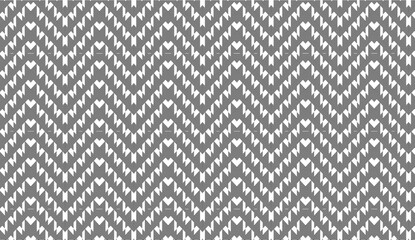 Seamless geometric pattern forming a textured houndstooth background, ideal for fashion, textile and interior design projects