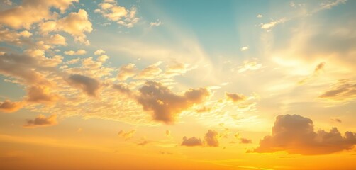 Obraz premium Vast, clear summer sky; sunset hues paint soft yellow and white clouds, atmosphere, cirrus