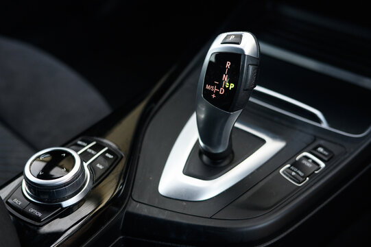 Close-Up of Automatic Gear Selector in Modern Car - Powered by Adobe