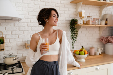 young pretty woman cooking at home, morning kitchen, healthy food