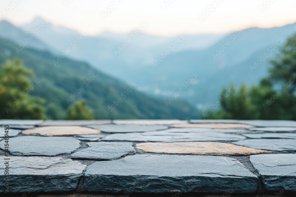 Poster empty stone table overlooking misty mountain landscape for product placement