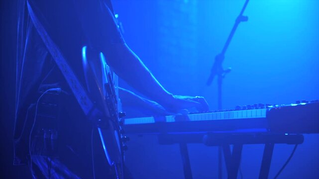 Pianist playing live on stage