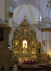 Marbella, Spain - Mar 30, 2025: Walking in Marbella. Church of Our Lady of the Incarnation. Streets, buildings. Lifestyle in the urban area. Sunny spring day. Selective focus
