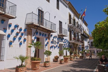 Marbella, Spain - Mar 30, 2025: Walking in Marbella. City Hall. Streets, buildings. Lifestyle in the urban area. Sunny spring day. Selective focus