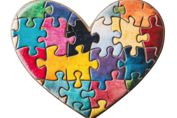 Colorful puzzle pieces shaped like a heart, symbolizing love and unity.
