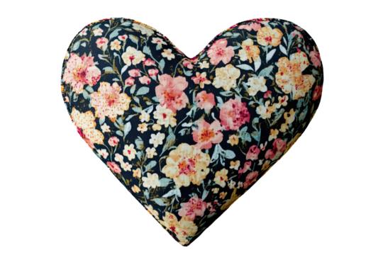 Floral heart-shaped pillow, decorative home accessory, soft fabric, colorful design, perfect for cozy living spaces.