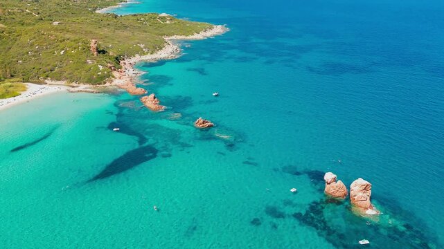 Aerial drone view of the Cea beach with the Red Rocks, Sardinia, Italy