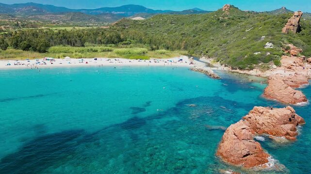 Aerial drone view of the Cea beach with the Red Rocks, Sardinia, Italy