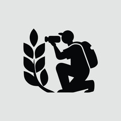Agricultural Photographer Kneeling with Camera and Backpack Icon