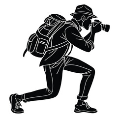 Silhouette of a Photographer with Backpack Taking a Picture