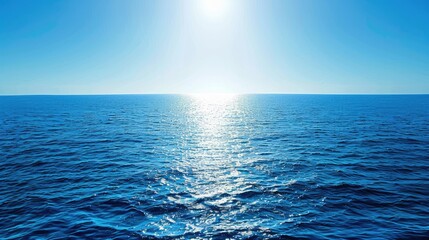 Fototapeta premium Serene ocean view with gentle waves under a bright sun, evoking tranquility and peacefulness