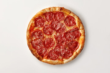 Delicious pepperoni pizza with grated parmesan lying on white background