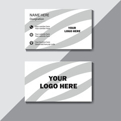 Naklejka premium Modern business card design and simple template vector design with silver and white. 
