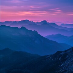 Fototapeta premium Serene mountain landscape silhouette at twilight or dawn. Layers of peaks fade into a hazy atmosphere under a beautiful purple and pink gradient sky. Peaceful vista. 