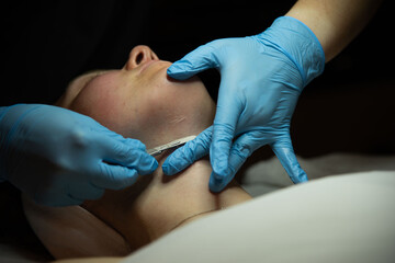 Woman getting facial at spa