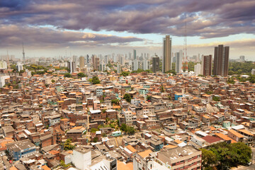 Urban social contrast. Favela and buildings