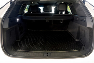 Large black empty car trunk. Open car trunk close up
