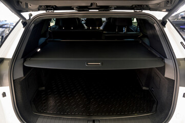 Large black empty car trunk. Open car trunk close up