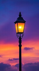 Elegant street lamp glowing brightly against a stunning sunset backdrop, casting a warm ambiance and captivating colors that evoke a tranquil evening atmosphere.