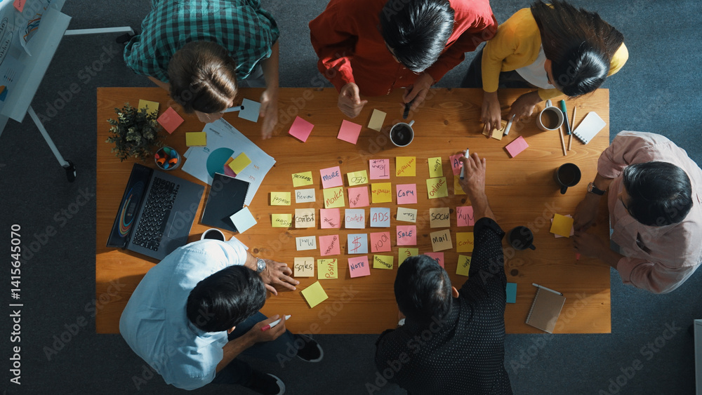 Poster top view of smart diverse business team working together and clapping hand while brainstorming marke