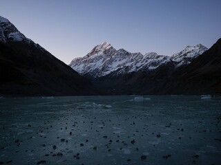Frozen Lake Hooker view of Mount Cook Aoraki, snow covered alpine mountain landscape of Southern...