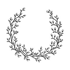 A delicate romantic floral wreath with tiny buds and flowers carefully arranged in a circle shape.