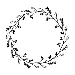 A delicate romantic floral wreath with tiny buds and flowers carefully arranged in a circle shape.