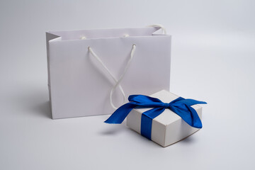 Gift box with bow on colorful background. Happy holidays, gift box close up. Boxing day surprise....
