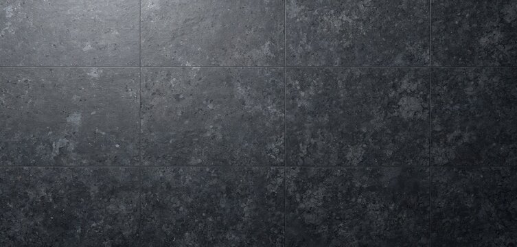 Top view of dark gray granite terrace slabs. Natural stone texture with black anthracite pattern. Rough surface tile for building design or outdoor exterior floor.