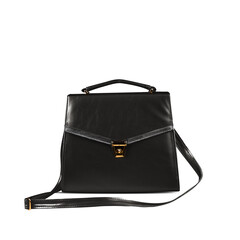 Black fashion purse handbag on white background isolated