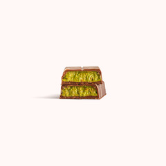 Dubai chocolate bar with pistachio and kunafa filling isolated on white