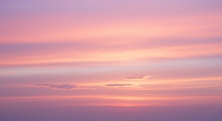 Fototapeta premium Serene sunset with pastel hues over a tranquil sky 