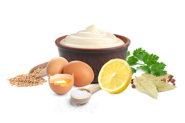 Mayonnaise ingredients and prepared sauce on white background