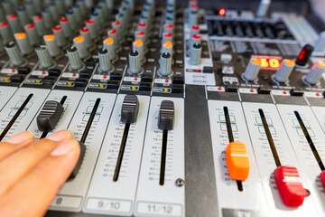 Music equalizer, sound knobs and volume controls that mix sound from a broadcasting and television...