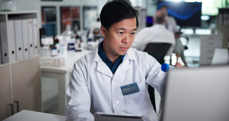 Computer, scientist and thinking with man in laboratory for healthcare, medical research or test...