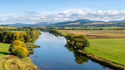 Panoramic View Of River Winding Through Autumnal Landscape