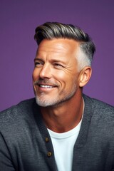 Obraz premium Artwork of style for aging men. Chic men's mid fade haircut - midlife white man with hair. Purple solid background. A glowing and peaceful man expressing warmth.