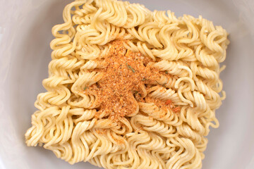 Top view of instant noodles in a bowl	