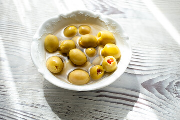 green olives in a glass